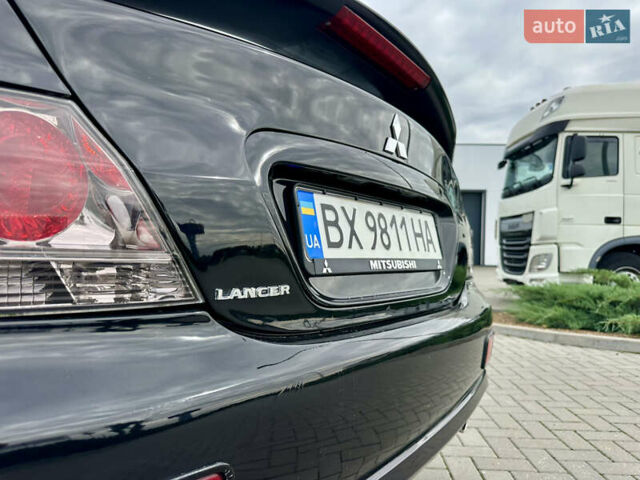 Чорний Міцубісі Lancer, об'ємом двигуна 2 л та пробігом 275 тис. км за 5300 $, фото 27 на Automoto.ua