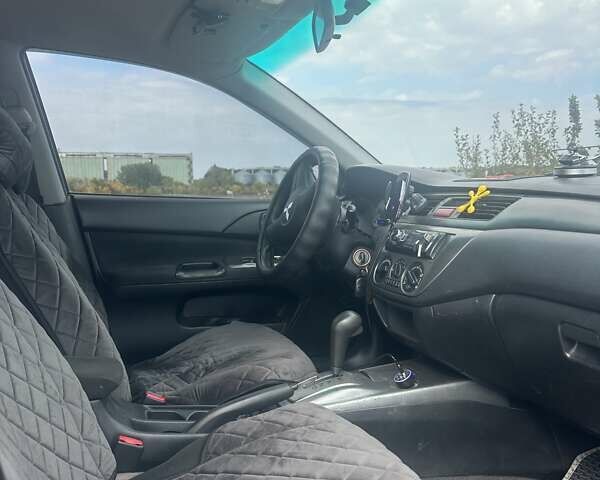 Чорний Міцубісі Lancer, об'ємом двигуна 1.6 л та пробігом 310 тис. км за 5100 $, фото 12 на Automoto.ua