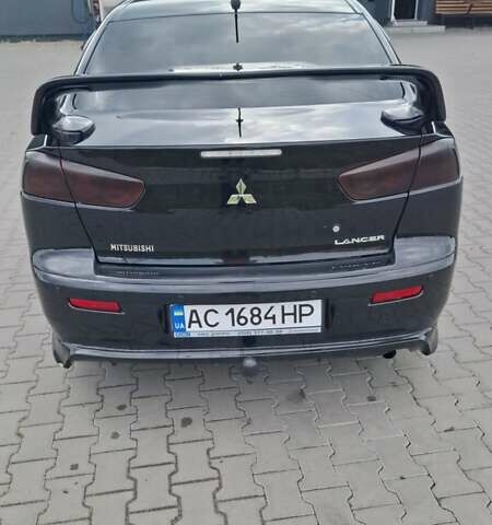Чорний Міцубісі Lancer, об'ємом двигуна 2 л та пробігом 207 тис. км за 6500 $, фото 6 на Automoto.ua