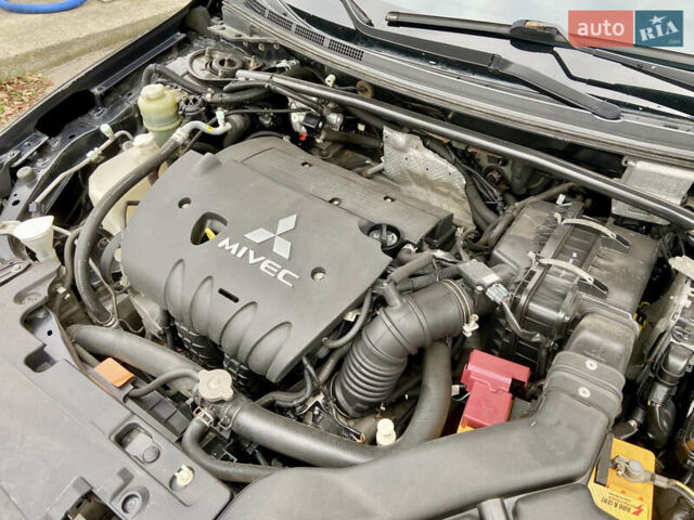Чорний Міцубісі Lancer, об'ємом двигуна 2 л та пробігом 222 тис. км за 7500 $, фото 20 на Automoto.ua