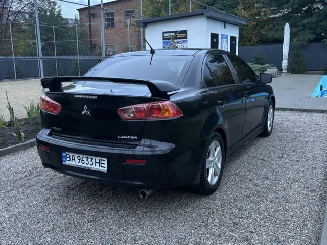 Чорний Міцубісі Lancer, об'ємом двигуна 2 л та пробігом 300 тис. км за 6185 $, фото 4 на Automoto.ua