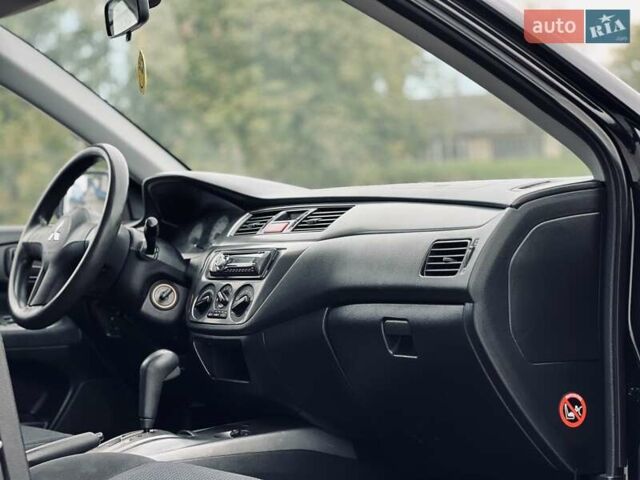 Чорний Міцубісі Lancer, об'ємом двигуна 1.6 л та пробігом 243 тис. км за 4950 $, фото 42 на Automoto.ua
