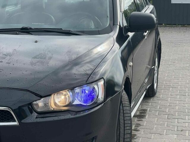 Черный Мицубиси Лансер, объемом двигателя 2 л и пробегом 350 тыс. км за 4299 $, фото 7 на Automoto.ua