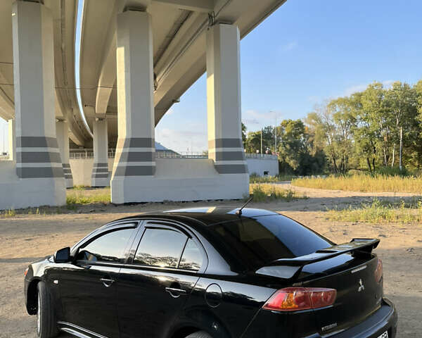 Чорний Міцубісі Lancer, об'ємом двигуна 2 л та пробігом 230 тис. км за 6700 $, фото 4 на Automoto.ua