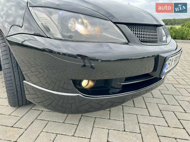 Чорний Міцубісі Lancer, об'ємом двигуна 2 л та пробігом 275 тис. км за 5300 $, фото 33 на Automoto.ua