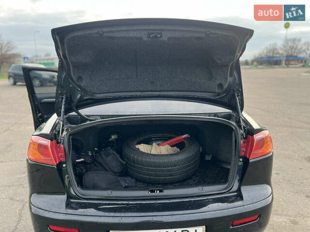 Чорний Міцубісі Lancer, об'ємом двигуна 1.5 л та пробігом 209 тис. км за 5500 $, фото 27 на Automoto.ua