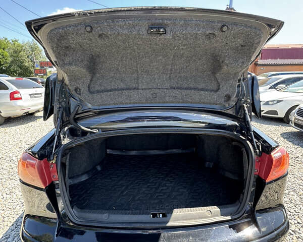 Чорний Міцубісі Lancer, об'ємом двигуна 2 л та пробігом 253 тис. км за 6400 $, фото 10 на Automoto.ua