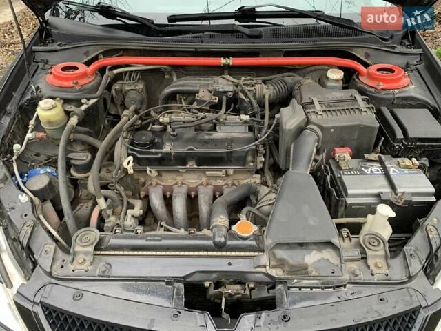 Черный Мицубиси Лансер, объемом двигателя 1.6 л и пробегом 164 тыс. км за 5200 $, фото 15 на Automoto.ua