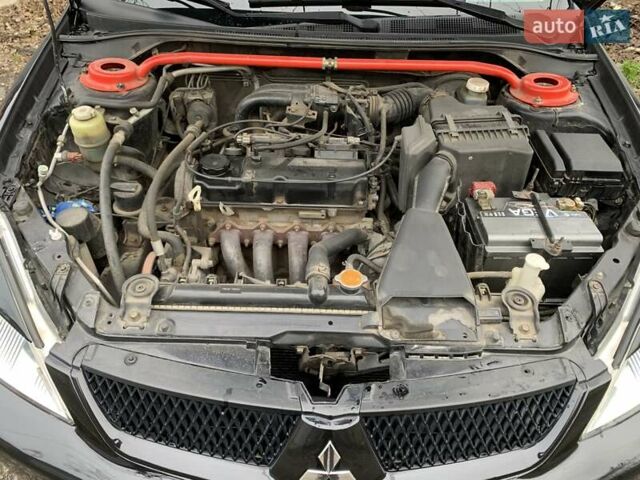 Черный Мицубиси Лансер, объемом двигателя 1.6 л и пробегом 164 тыс. км за 5200 $, фото 14 на Automoto.ua