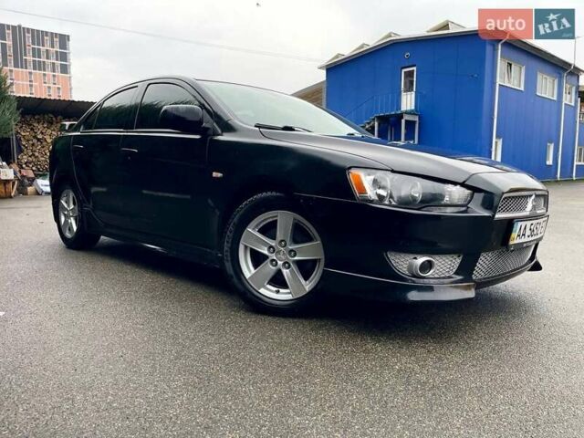 Чорний Міцубісі Lancer, об'ємом двигуна 2 л та пробігом 69 тис. км за 5700 $, фото 1 на Automoto.ua
