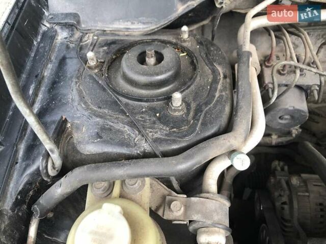 Чорний Міцубісі Lancer, об'ємом двигуна 1.59 л та пробігом 179 тис. км за 4980 $, фото 7 на Automoto.ua