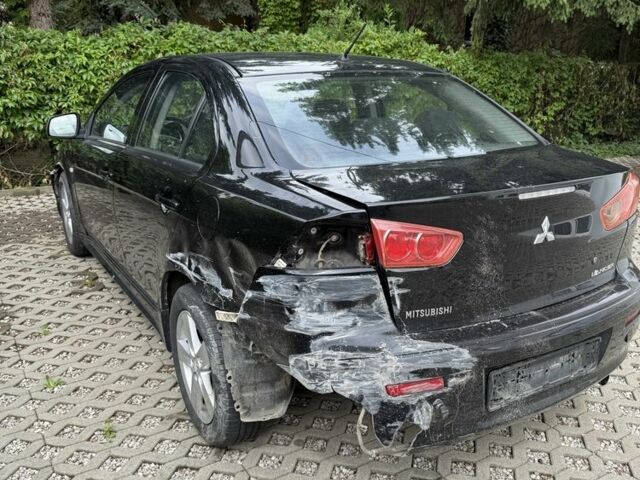 Чорний Міцубісі Lancer, об'ємом двигуна 2 л та пробігом 245 тис. км за 3500 $, фото 4 на Automoto.ua