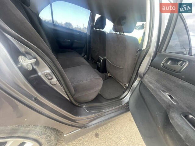 Чорний Міцубісі Lancer, об'ємом двигуна 1.6 л та пробігом 162 тис. км за 4650 $, фото 11 на Automoto.ua