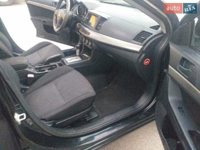 Черный Мицубиси Лансер, объемом двигателя 1.5 л и пробегом 270 тыс. км за 4500 $, фото 19 на Automoto.ua