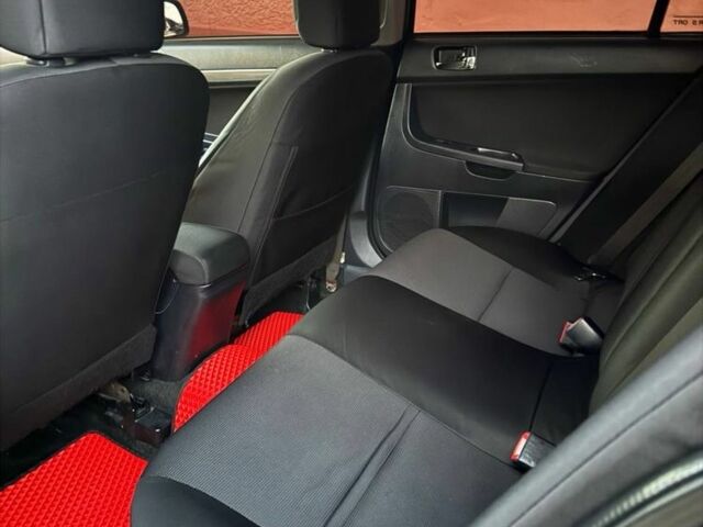 Черный Мицубиси Лансер, объемом двигателя 2 л и пробегом 247 тыс. км за 4700 $, фото 7 на Automoto.ua