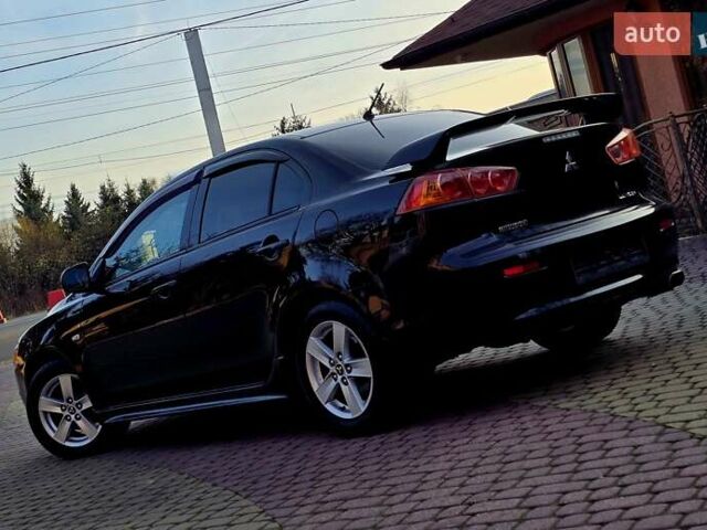 Чорний Міцубісі Lancer, об'ємом двигуна 2 л та пробігом 260 тис. км за 6555 $, фото 2 на Automoto.ua