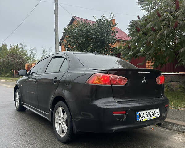 Чорний Міцубісі Lancer, об'ємом двигуна 2 л та пробігом 292 тис. км за 4400 $, фото 4 на Automoto.ua