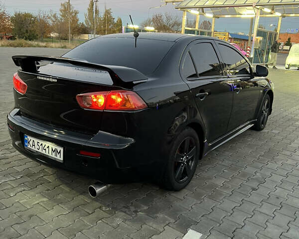 Мицубиси Лансер 2007 в Николаеве на Automoto.ua Черный Мицубиси Лансер, объемом двигателя 2 л и пробегом 282 тыс. км за 6500 $, фото 7 на Automoto.ua