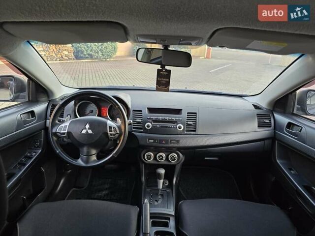 Чорний Міцубісі Lancer, об'ємом двигуна 2 л та пробігом 260 тис. км за 6555 $, фото 31 на Automoto.ua