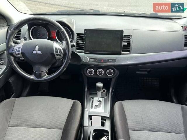 Чорний Міцубісі Lancer, об'ємом двигуна 2 л та пробігом 284 тис. км за 6200 $, фото 18 на Automoto.ua