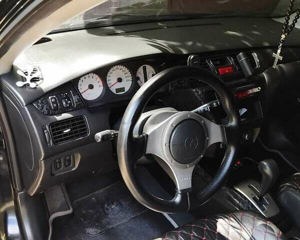 Мицубиси Лансер 2007 в Краматорске на Automoto.ua Черный Мицубиси Лансер, объемом двигателя 2 л и пробегом 193 тыс. км за 6250 $, фото 3 на Automoto.ua
