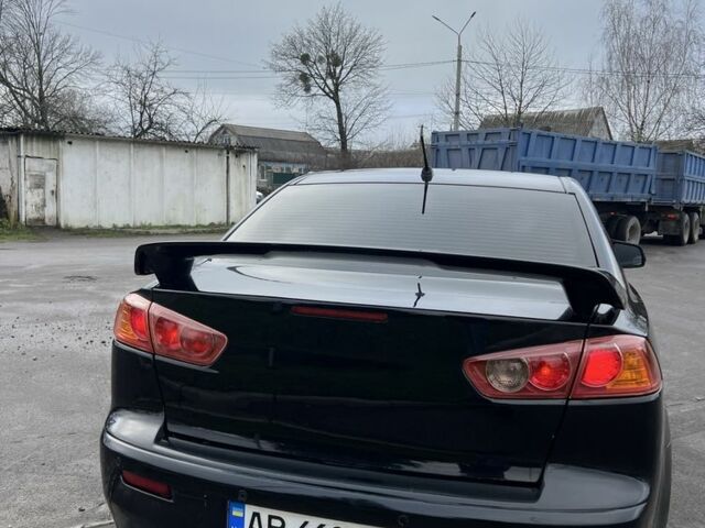 Черный Мицубиси Лансер, объемом двигателя 2 л и пробегом 350 тыс. км за 6700 $, фото 3 на Automoto.ua