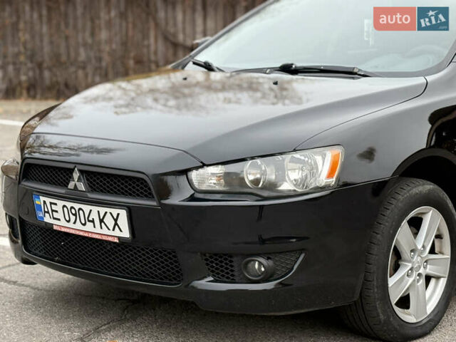 Чорний Міцубісі Lancer, об'ємом двигуна 2 л та пробігом 224 тис. км за 6500 $, фото 2 на Automoto.ua