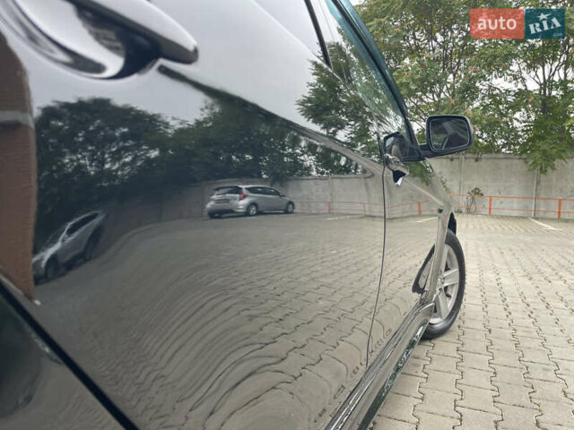 Черный Мицубиси Лансер, объемом двигателя 2 л и пробегом 200 тыс. км за 6199 $, фото 6 на Automoto.ua