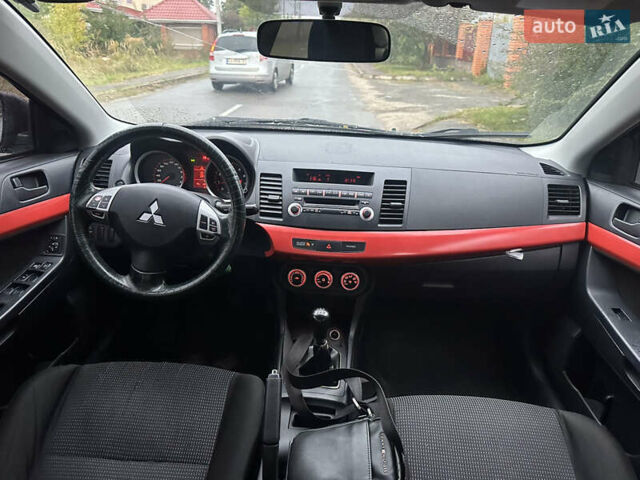 Чорний Міцубісі Lancer, об'ємом двигуна 2 л та пробігом 292 тис. км за 4400 $, фото 7 на Automoto.ua