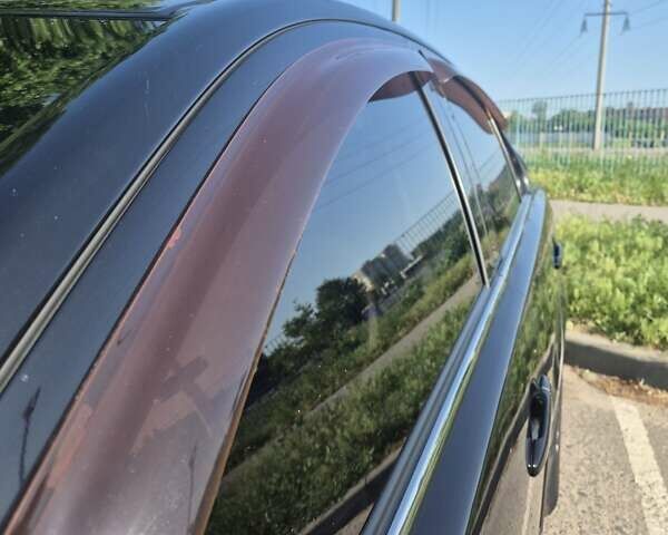 Чорний Міцубісі Lancer, об'ємом двигуна 2 л та пробігом 243 тис. км за 6600 $, фото 31 на Automoto.ua