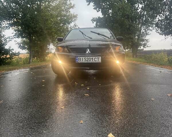 Чорний Міцубісі Lancer, об'ємом двигуна 1.6 л та пробігом 310 тис. км за 5100 $, фото 29 на Automoto.ua