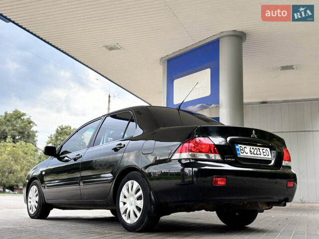 Чорний Міцубісі Lancer, об'ємом двигуна 1.6 л та пробігом 173 тис. км за 3700 $, фото 8 на Automoto.ua