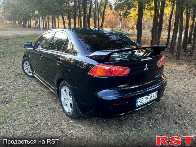 Чорний Міцубісі Lancer, об'ємом двигуна 2 л та пробігом 190 тис. км за 6800 $, фото 3 на Automoto.ua