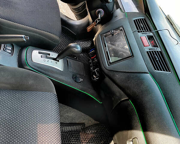 Чорний Міцубісі Lancer, об'ємом двигуна 1.6 л та пробігом 195 тис. км за 5200 $, фото 7 на Automoto.ua