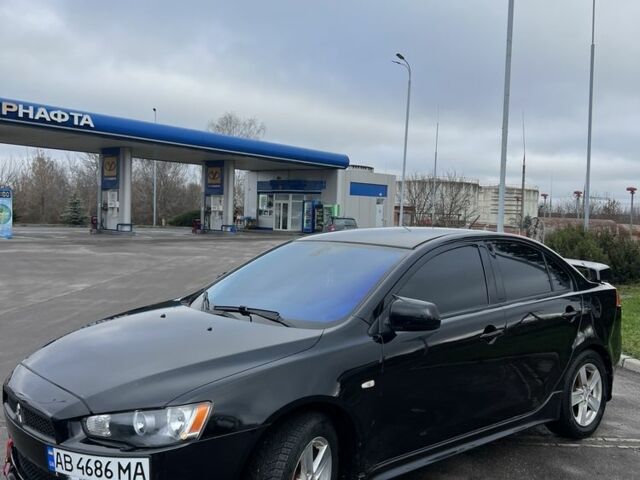 Черный Мицубиси Лансер, объемом двигателя 2 л и пробегом 350 тыс. км за 6700 $, фото 2 на Automoto.ua