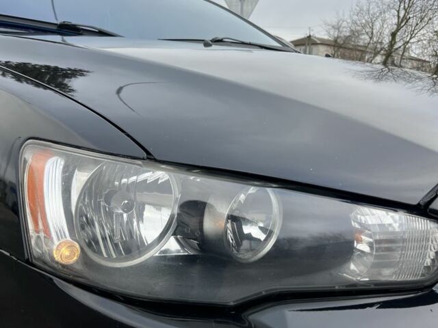 Черный Мицубиси Лансер, объемом двигателя 2 л и пробегом 350 тыс. км за 6700 $, фото 6 на Automoto.ua