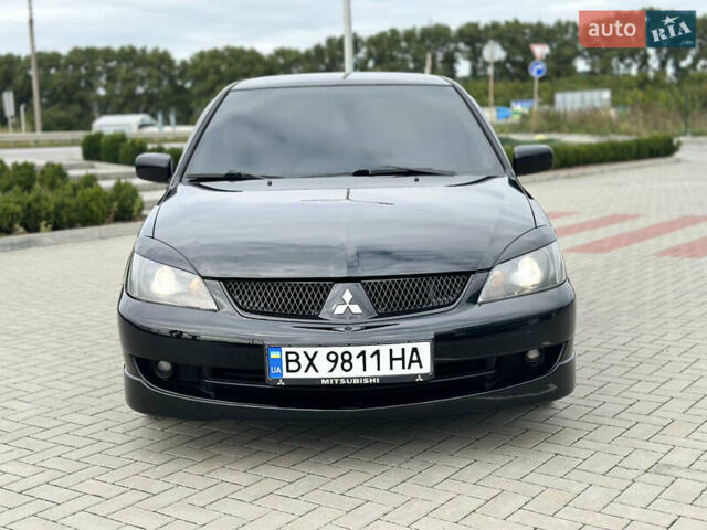 Чорний Міцубісі Lancer, об'ємом двигуна 2 л та пробігом 275 тис. км за 5300 $, фото 7 на Automoto.ua