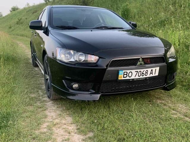 Чорний Міцубісі Lancer, об'ємом двигуна 2 л та пробігом 208 тис. км за 4455 $, фото 7 на Automoto.ua