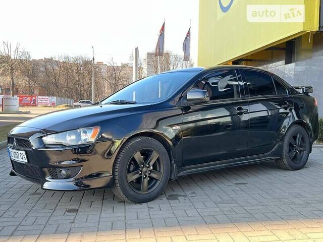 Чорний Міцубісі Lancer, об'ємом двигуна 2 л та пробігом 215 тис. км за 6400 $, фото 9 на Automoto.ua