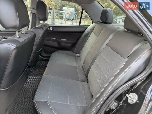 Чорний Міцубісі Lancer, об'ємом двигуна 2 л та пробігом 152 тис. км за 5500 $, фото 19 на Automoto.ua