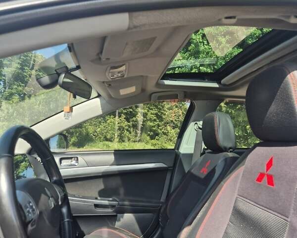 Чорний Міцубісі Lancer, об'ємом двигуна 2 л та пробігом 243 тис. км за 6600 $, фото 10 на Automoto.ua