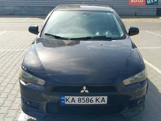 Чорний Міцубісі Lancer, об'ємом двигуна 2 л та пробігом 194 тис. км за 6500 $, фото 2 на Automoto.ua