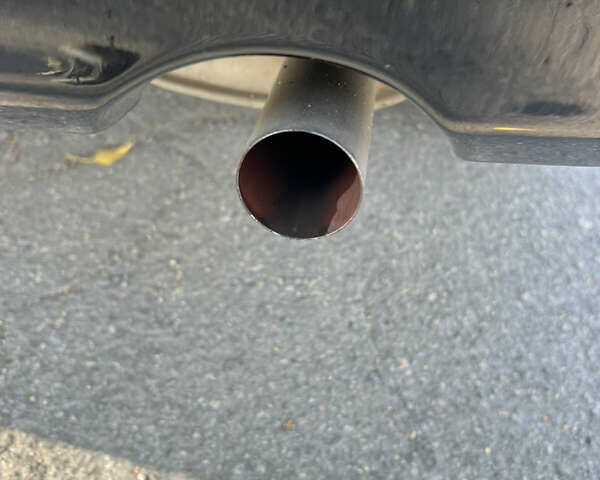 Чорний Міцубісі Lancer, об'ємом двигуна 1.58 л та пробігом 175 тис. км за 5200 $, фото 14 на Automoto.ua