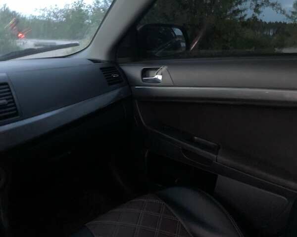 Мицубиси Лансер 2007 в Харькове на Automoto.ua Черный Мицубиси Лансер, объемом двигателя 2 л и пробегом 260 тыс. км за 5700 $, фото 3 на Automoto.ua