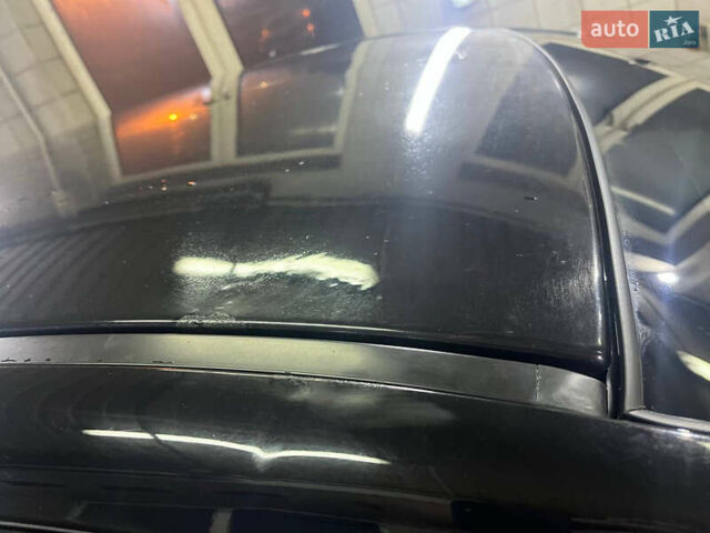 Черный Мицубиси Лансер, объемом двигателя 2 л и пробегом 200 тыс. км за 8000 $, фото 12 на Automoto.ua