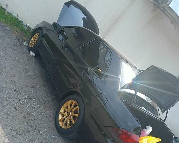 Мицубиси Лансер 2008 в Львове на Automoto.ua Черный Мицубиси Лансер, объемом двигателя 1.58 л и пробегом 200 тыс. км за 5200 $, фото 130 на Automoto.ua
