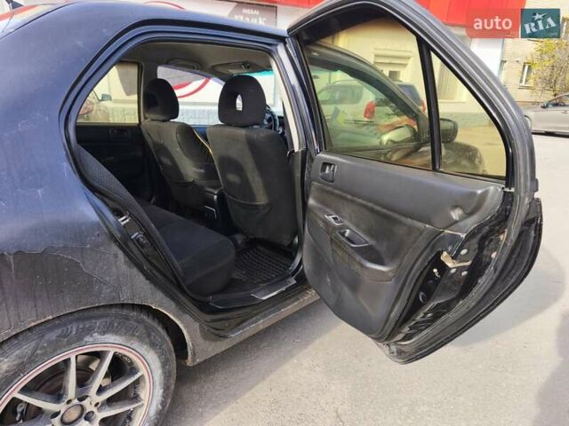 Черный Мицубиси Лансер, объемом двигателя 1.6 л и пробегом 358 тыс. км за 4300 $, фото 4 на Automoto.ua