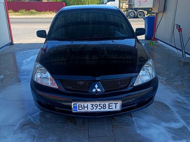 Чорний Міцубісі Lancer, об'ємом двигуна 1.6 л та пробігом 0 тис. км за 4200 $, фото 5 на Automoto.ua