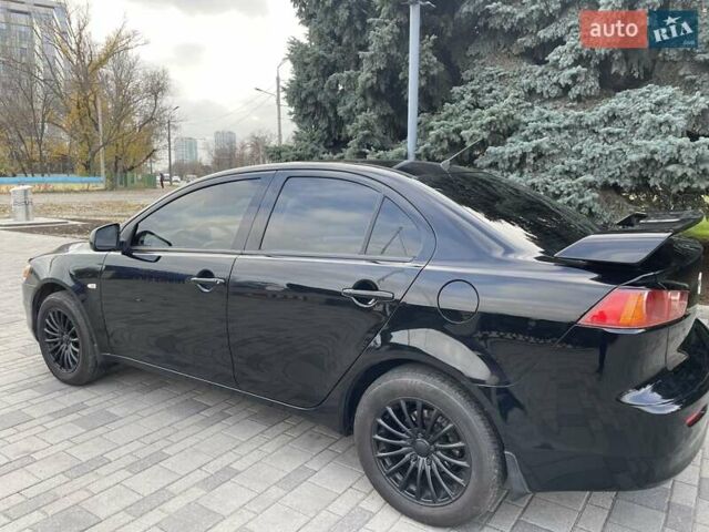 Чорний Міцубісі Lancer, об'ємом двигуна 1.5 л та пробігом 184 тис. км за 6000 $, фото 3 на Automoto.ua