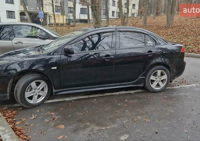 Чорний Міцубісі Lancer, об'ємом двигуна 2 л та пробігом 302 тис. км за 7200 $, фото 3 на Automoto.ua
